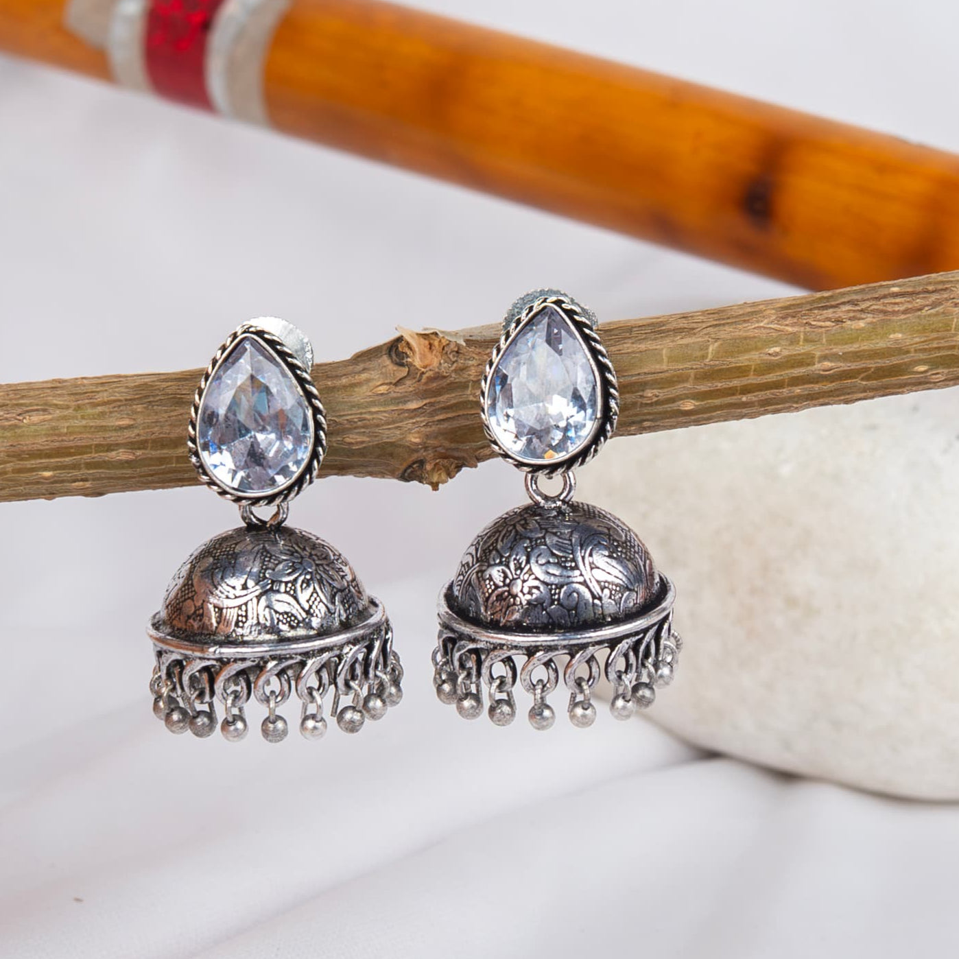 Silver Look-Alike Jhumka Earrings with Multicolor Gem Cabochons