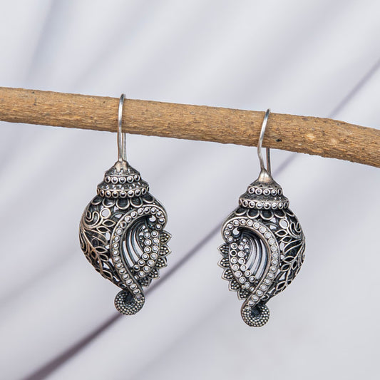 Silver Look Alike Shell-Shaped Earring with Intricate Filigree Work