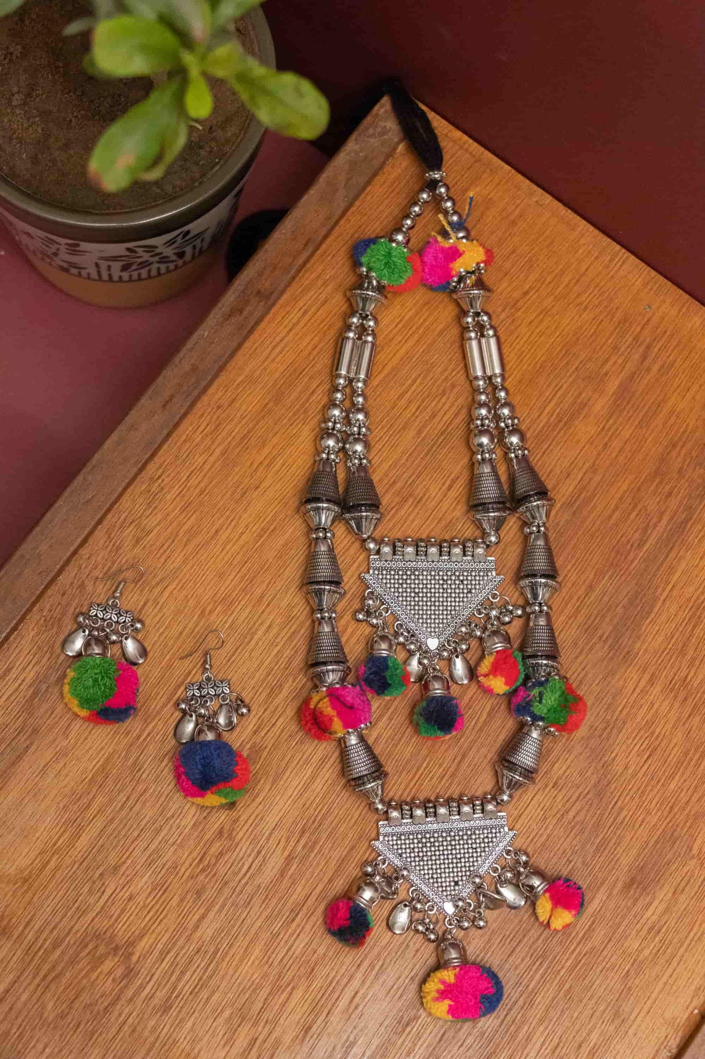 Oxodise Double Layer with Dangling Pom Poms Necklace