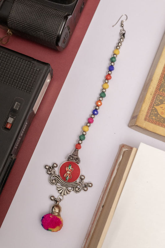 Multicolor Beaded Oxodise Tika with Red Floral Center & Pom Pom